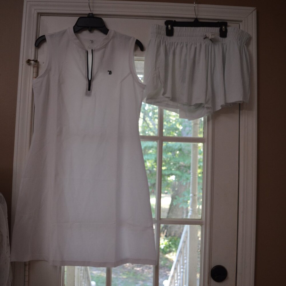 White sports dress and shorts size med. dress XL shorts new with tags